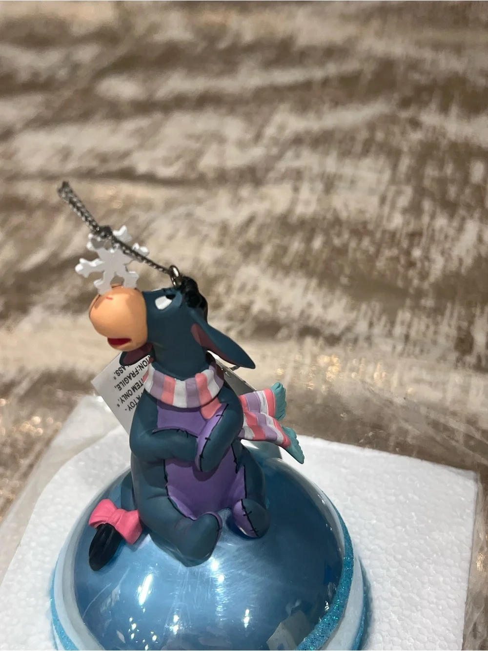 Disney eeyore perched